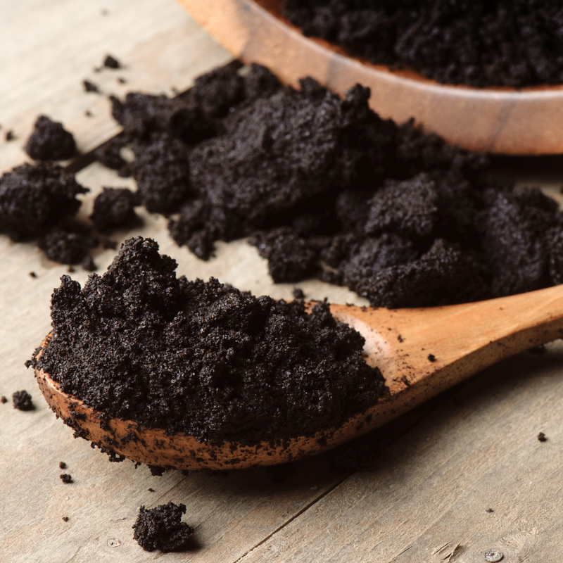 What are the consequences of putting coffee grounds